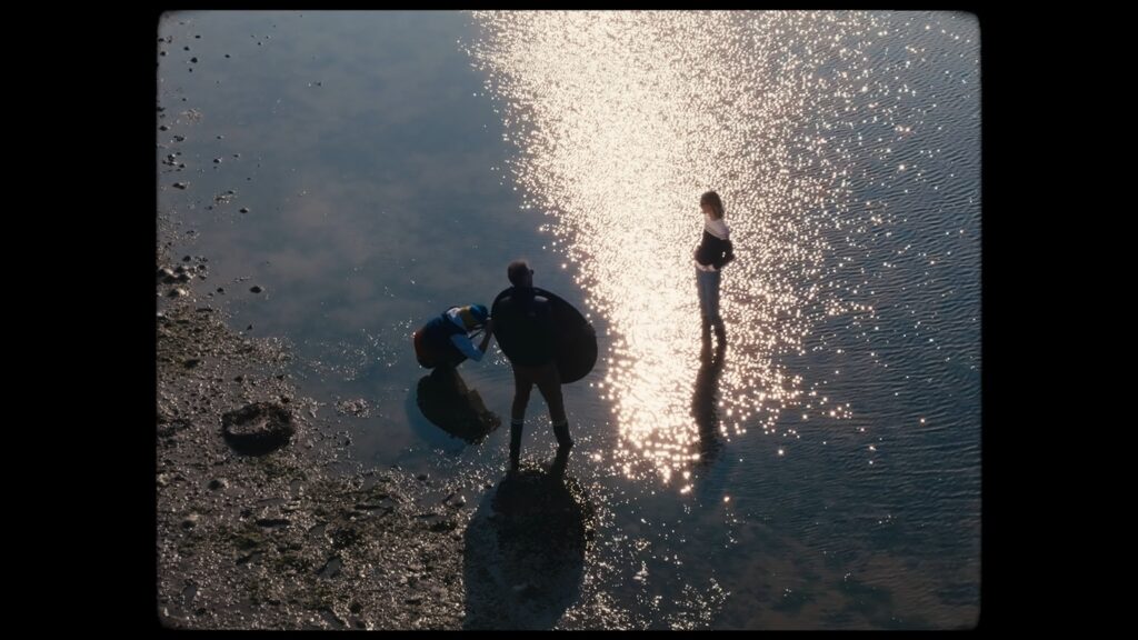 Drohnen-Aufnahme, Outdoor-Dreh, Kamera-Setup, Reflektor-Einsatz, Gegenlicht-Stimmung, Imagefilm-B-Roll, Wasser-Location, Golden-Hour
