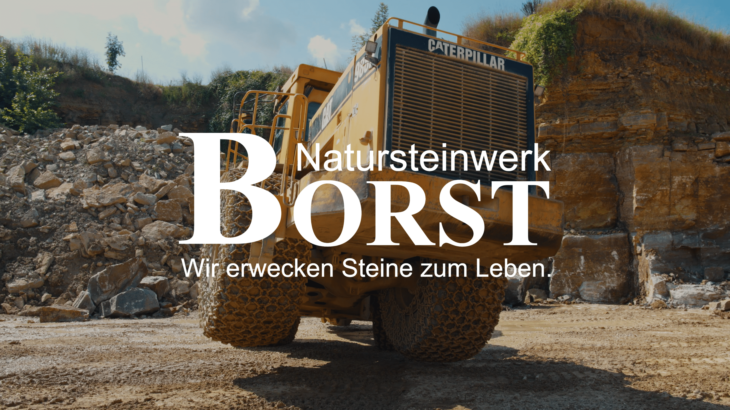 industrieumgebung-steinbruch radlader-nahaufnahme imagefilm-dreh b-roll natursteinwerk-produktionsfilm naturstein-abbau