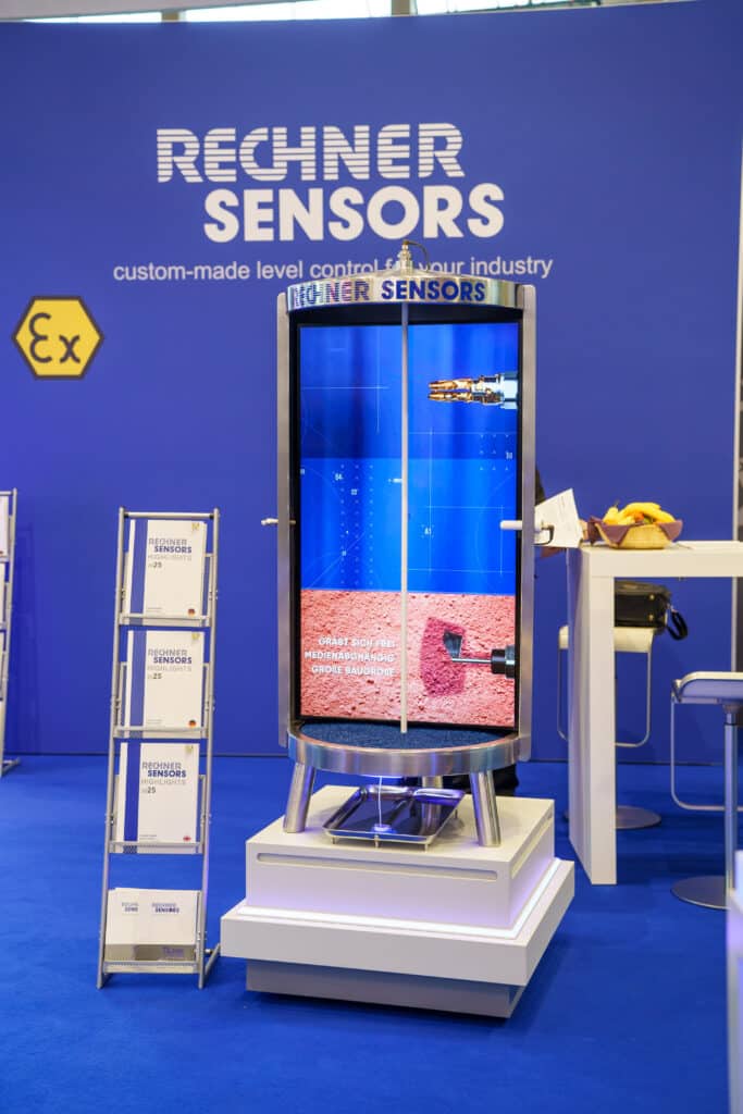 messefilm-setup produktvideo-display industrie-umgebung messe-stand sensorik-präsentation digital-signage display-setup ex-schutz-kennzeichnung b2b-marketing
